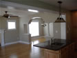 Decorative arch & columns separate the family room from the dining room in this Ocean County, Lavallette, NJ home.